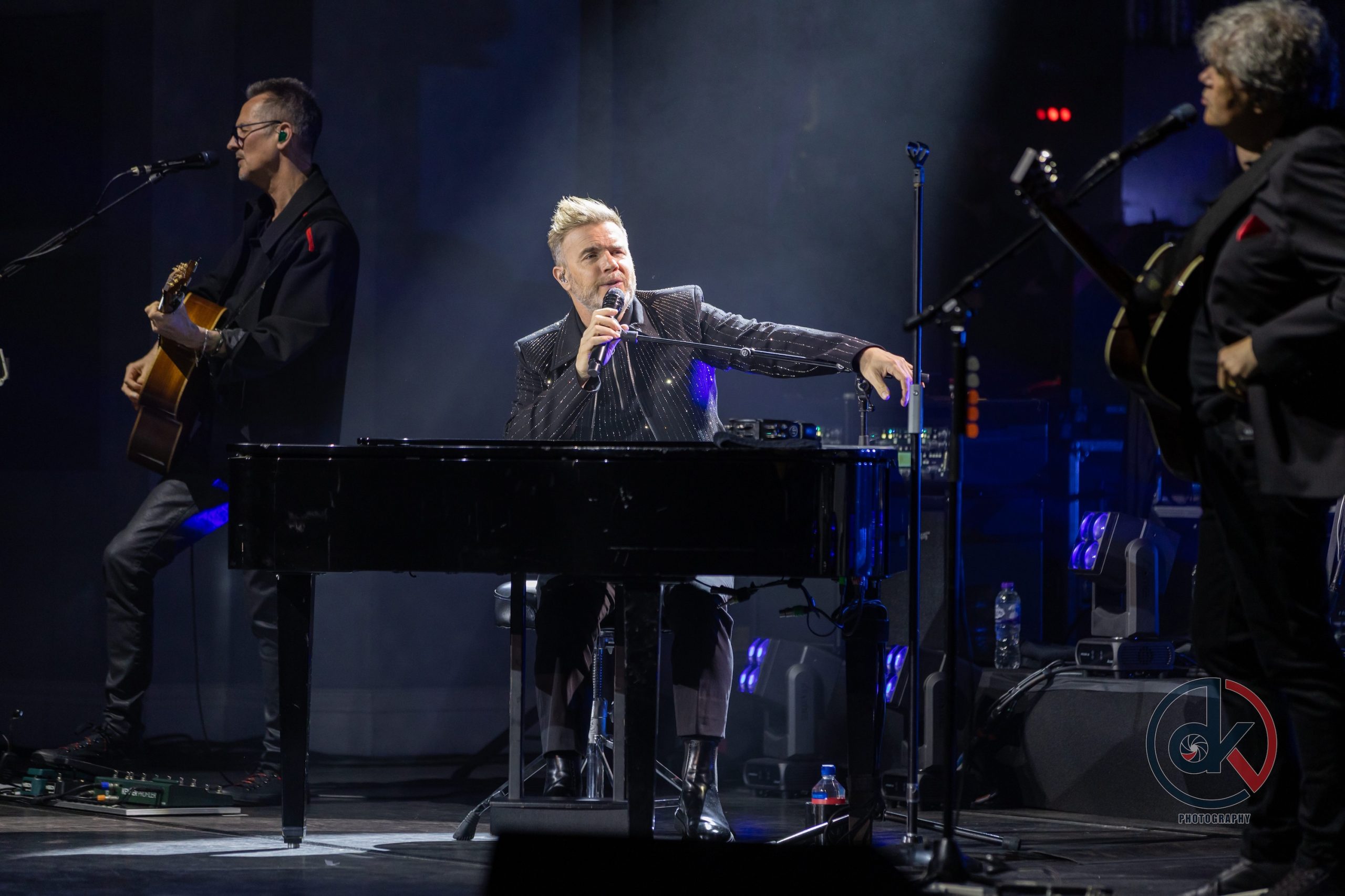 Gary Barlow performing on stage at Villa Marina